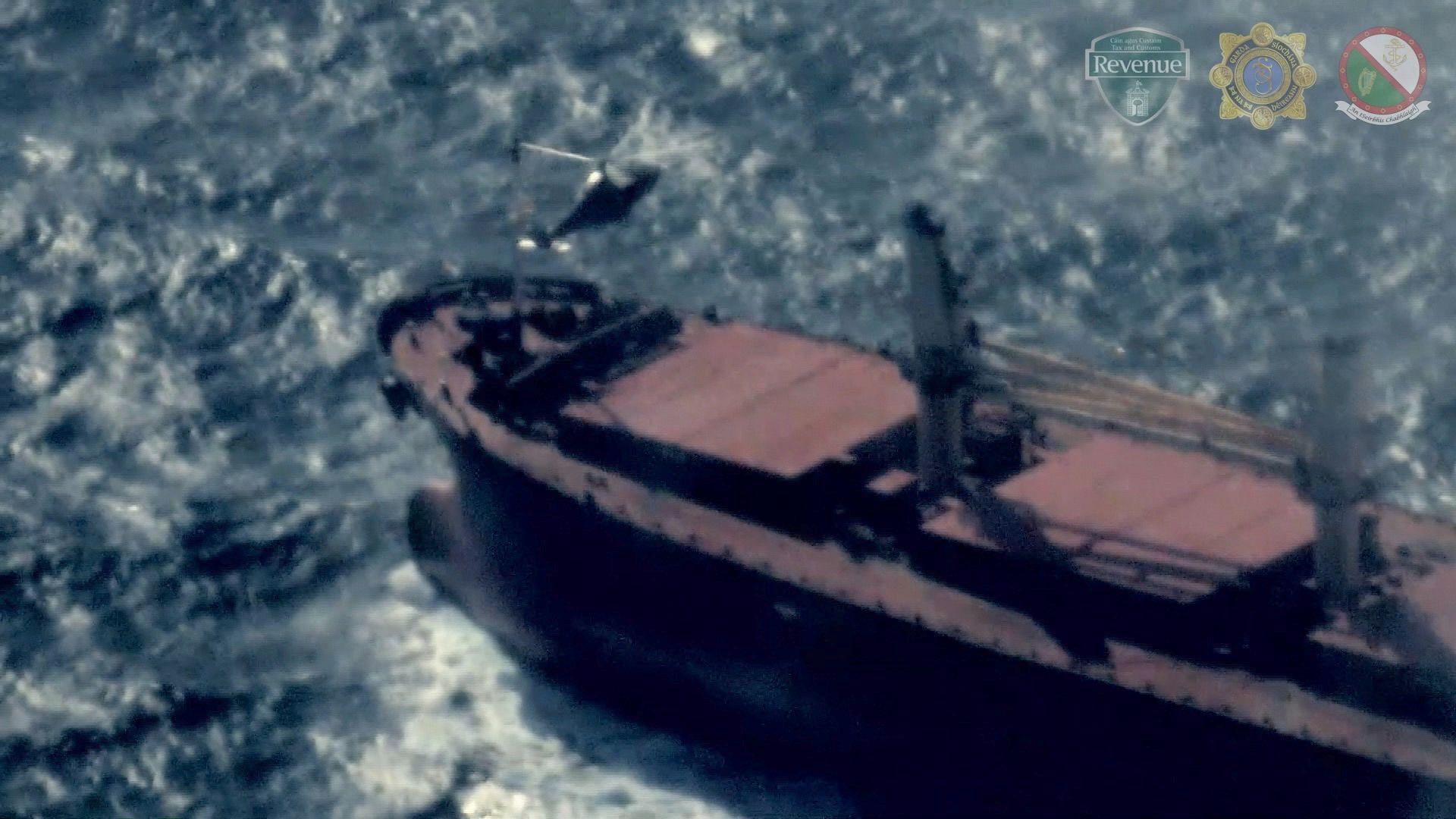 Pic taken from helicopter showing the MV Matthew at sea, with another helicopter hovering over the stern.