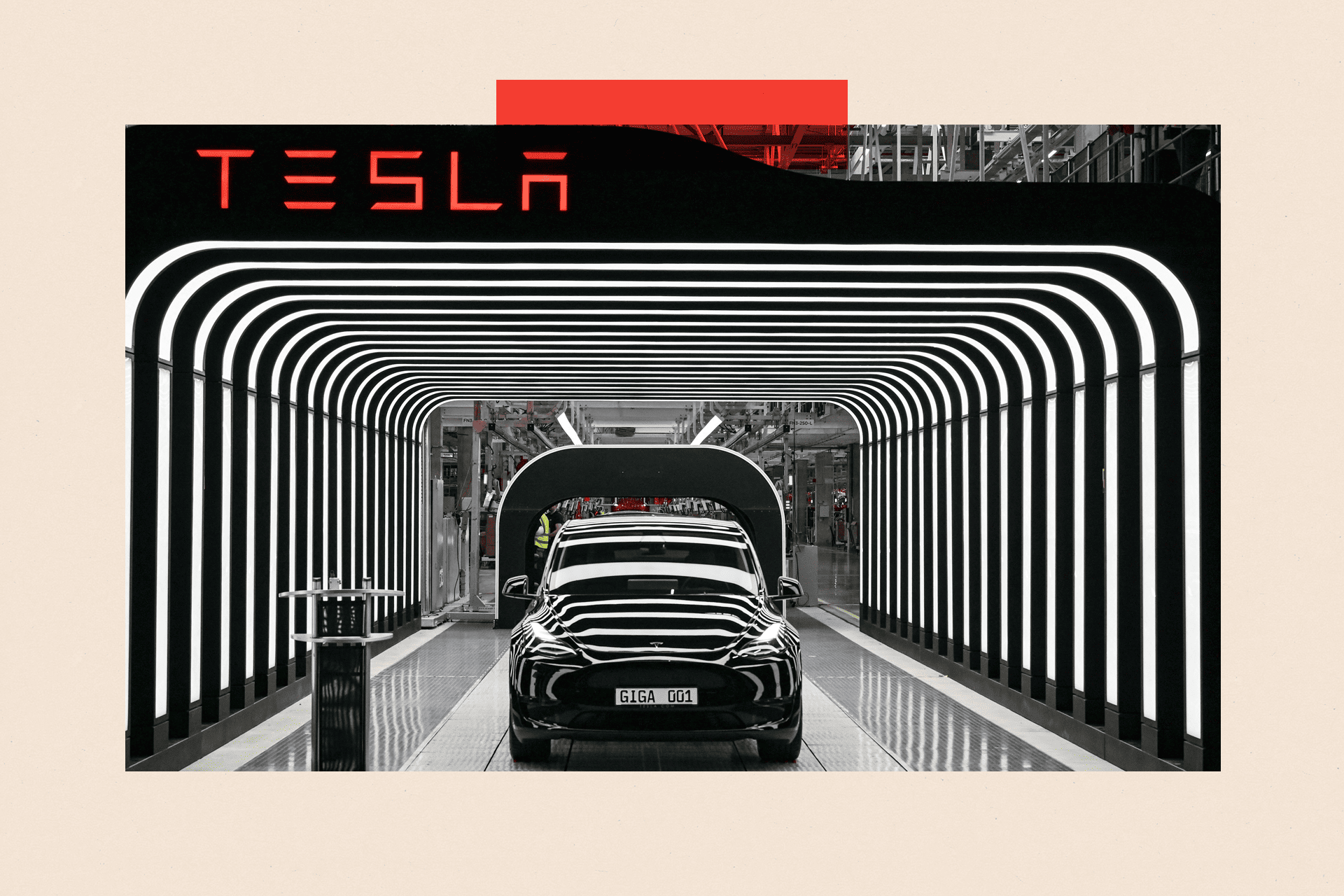 Tesla logo and car surrounded by lights