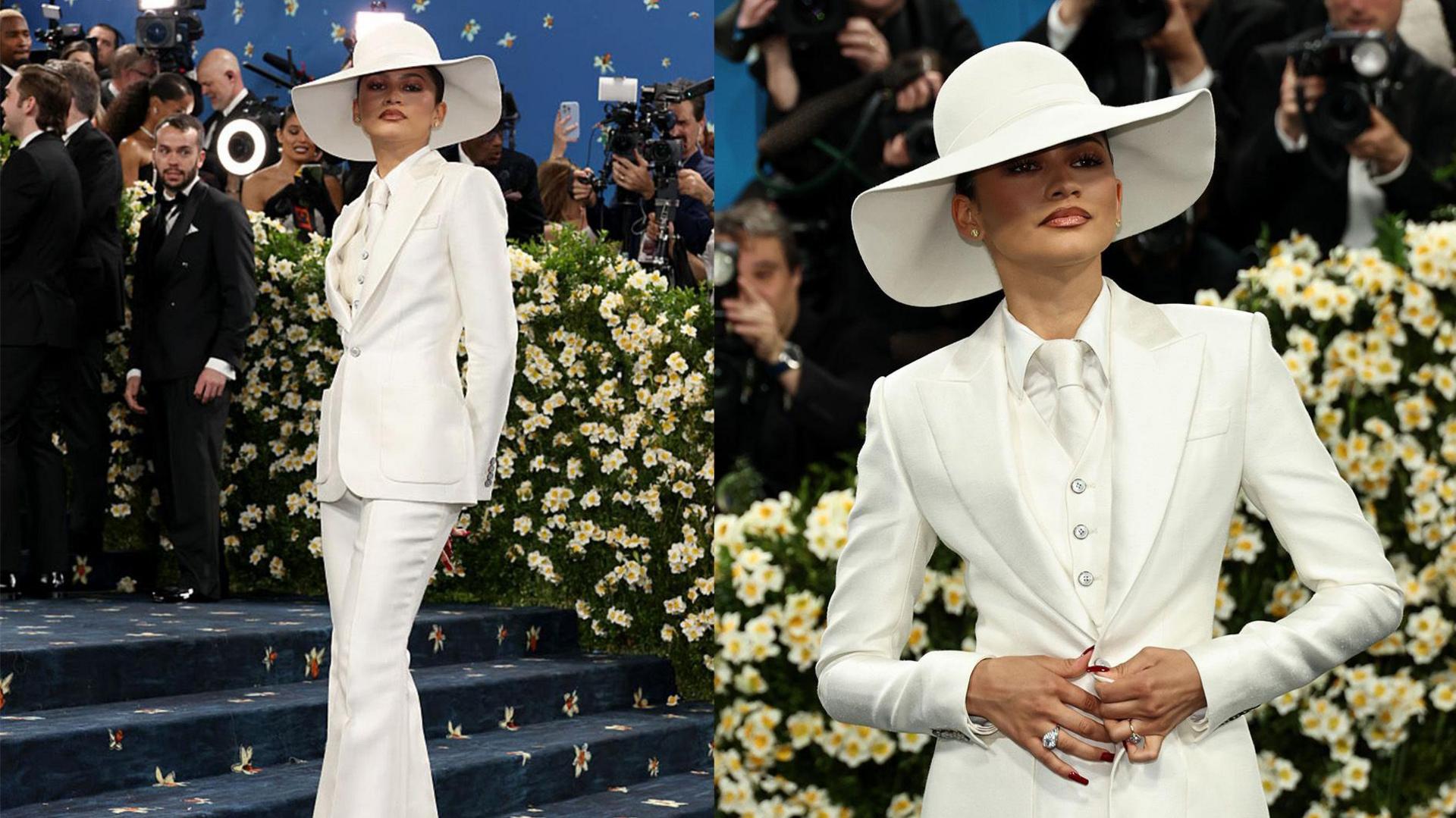 Zendaya wearing a white tailored suit on the Met Gala red carpet