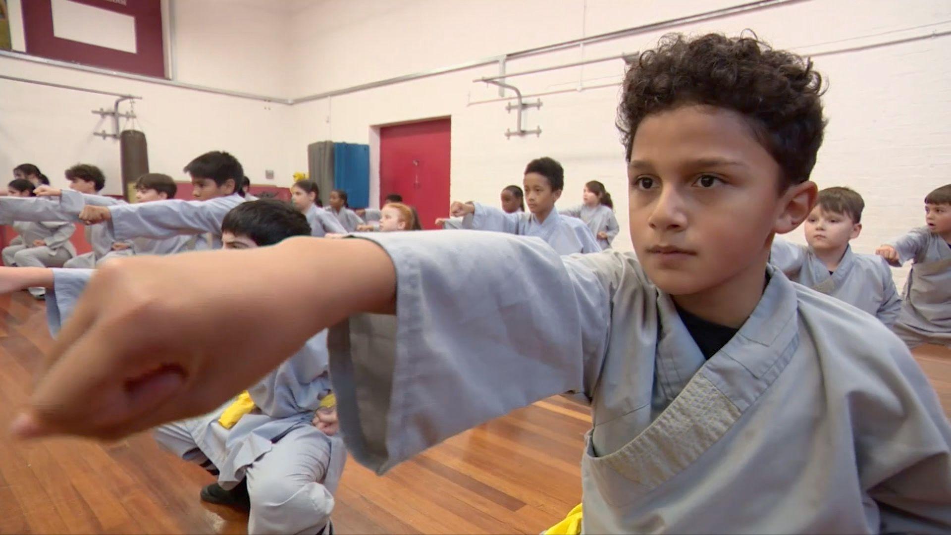 A boy in a Kung Fu class