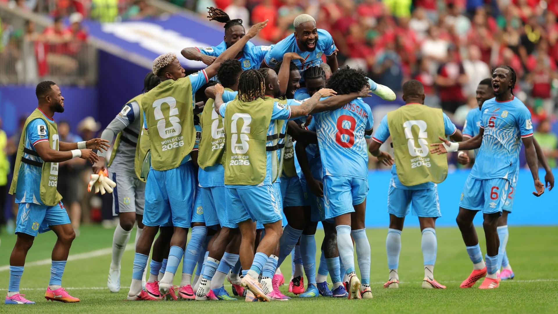 DR Congo celebrate after scoring against Portugal