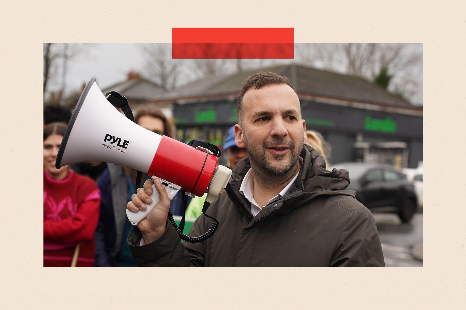 Green Party leader Zack Polanski with a megaphone