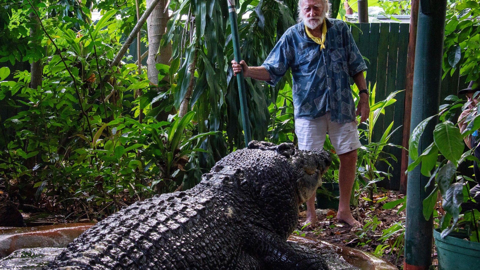 Green Island Marineland Melanesia's George Craig stands with Cassius the crocodile at the Marineland Melanesia on Green Island, Queensland, Australia, 18 March 2023