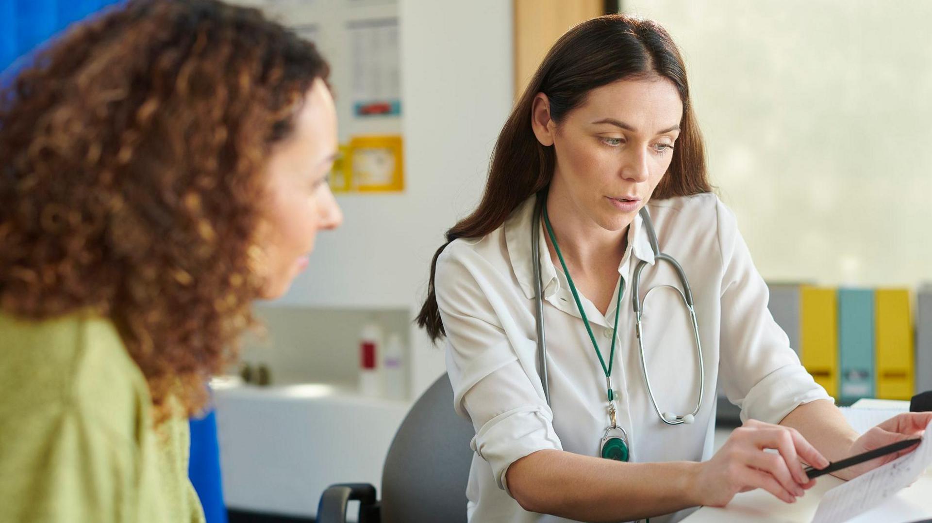 Patient chatting with a GP