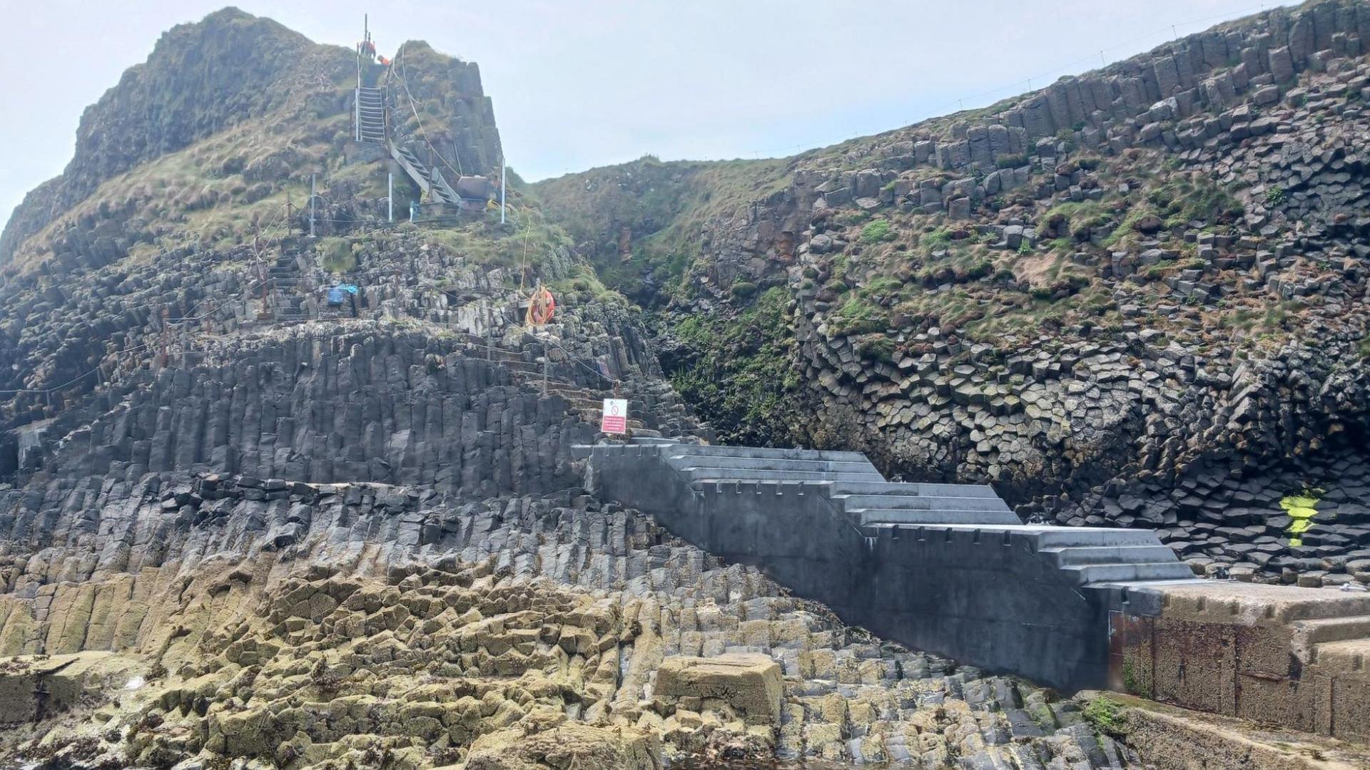 The new jetty and steps are brown and grey in colour to better blend into the landscape.