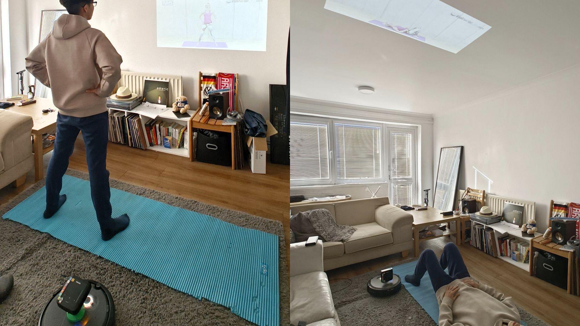 A robot with a projector attached that displayed a workout video on a wall or ceiling