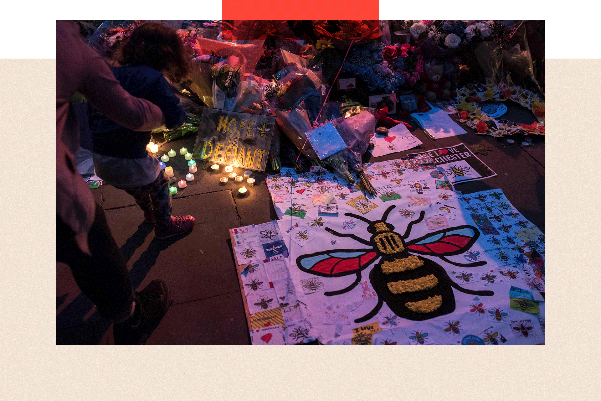 Flowers and balloons are placed in central Manchester on May 22, 2018, the one year anniversary of the deadly attack at Manchester Arena
