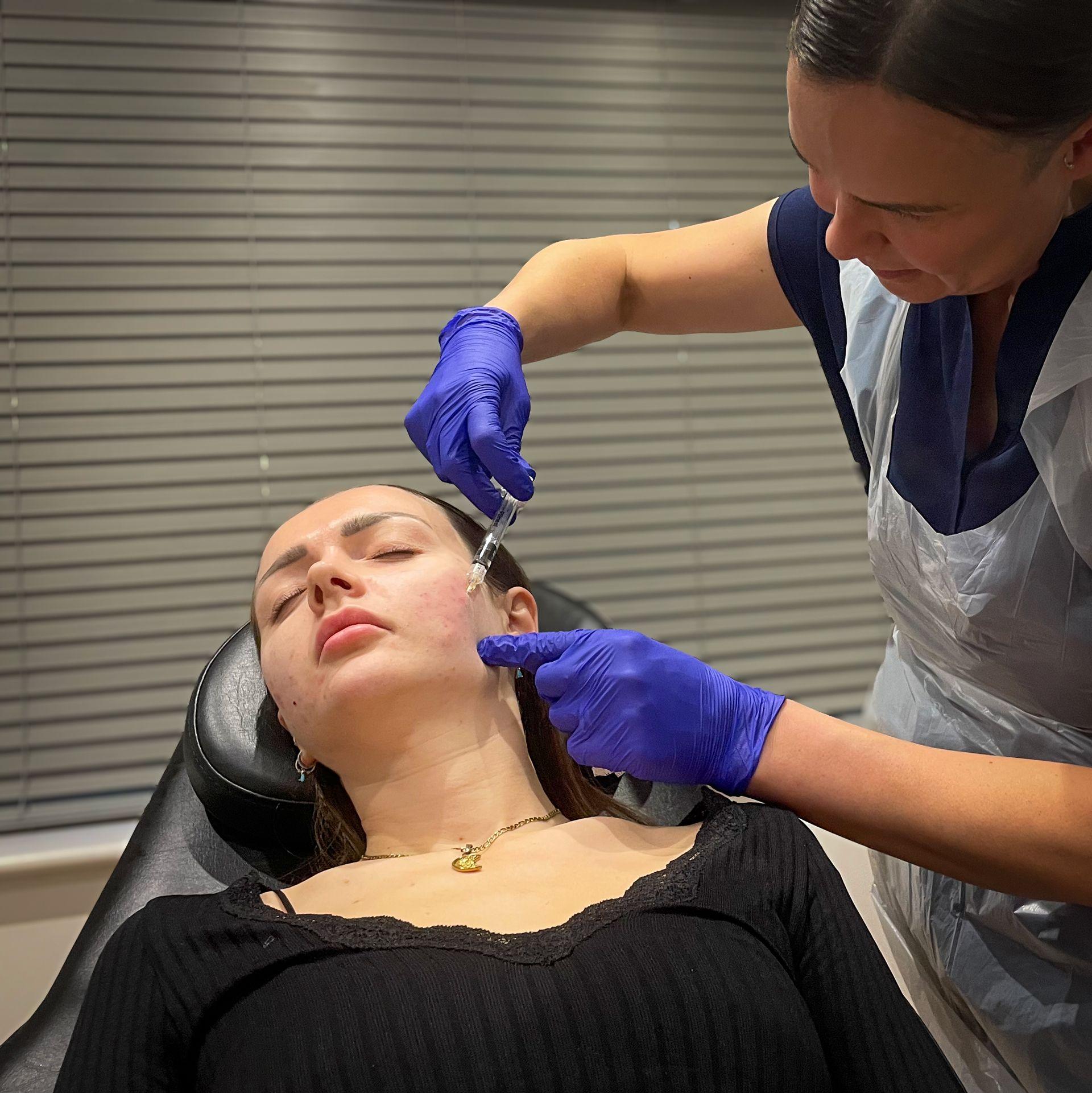 Abby undergoing facial injection