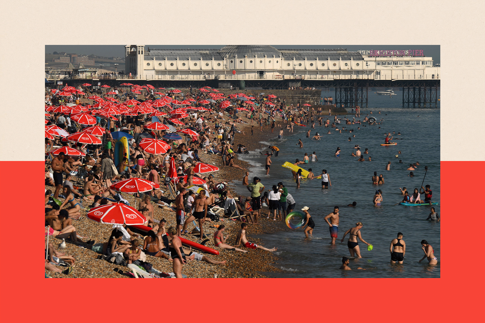 Looking towards the Palace Pier, beachgoers are seen enjoying the sun and the sea on the beach at Brighton, England, on 7 September 2023.