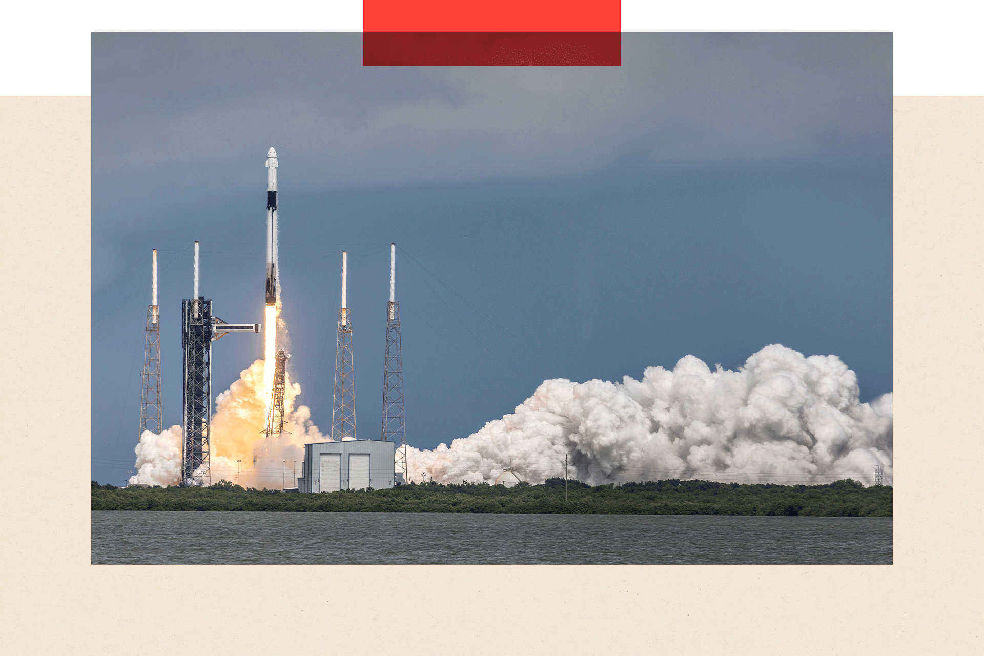 A rocket being launched in the sky as smoke surrounds the field