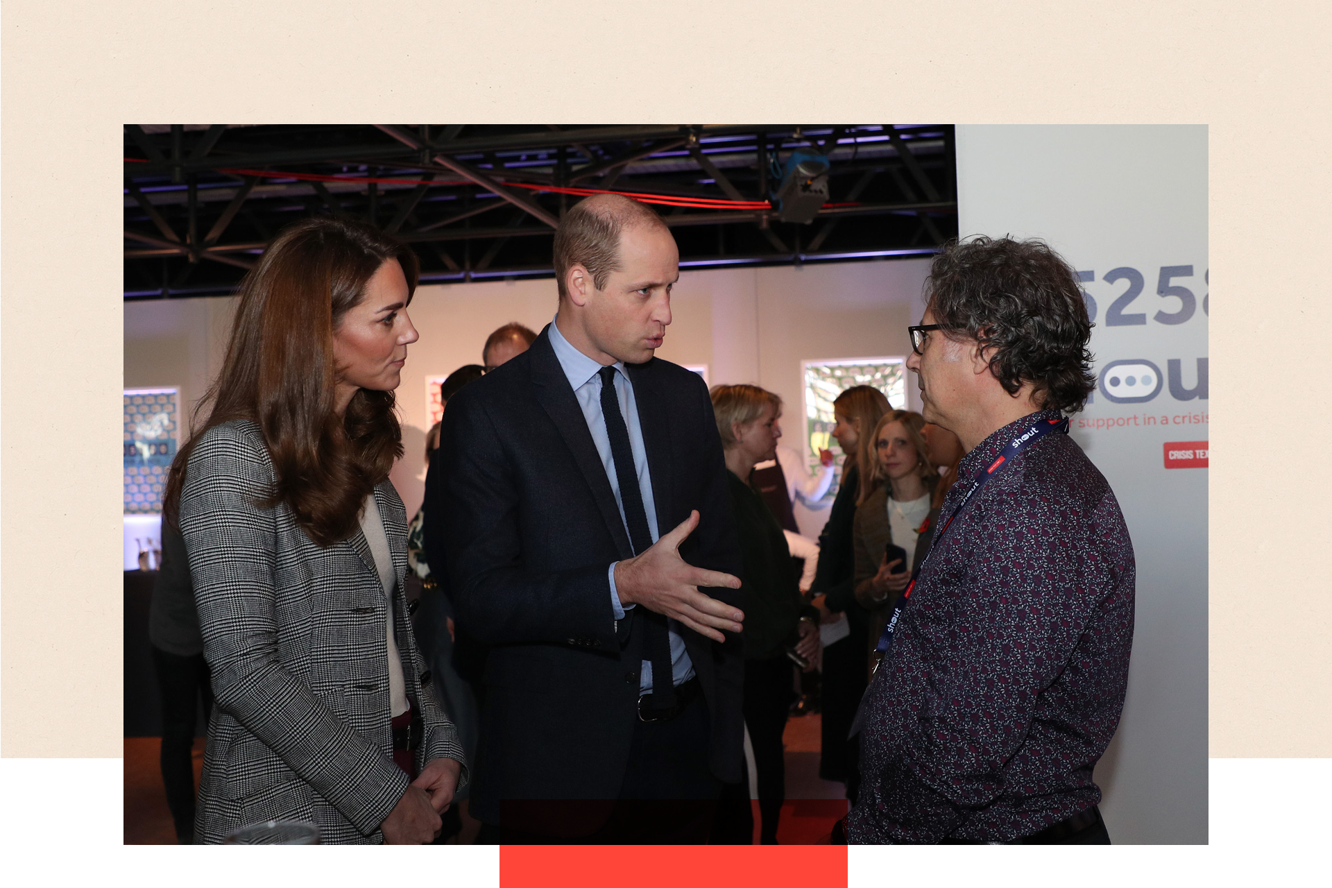 The Duchess of Cambridge in a grey suit, next to the Duke of Cambridge in a dark blue suit, and Ian Russell in a patterned shirt