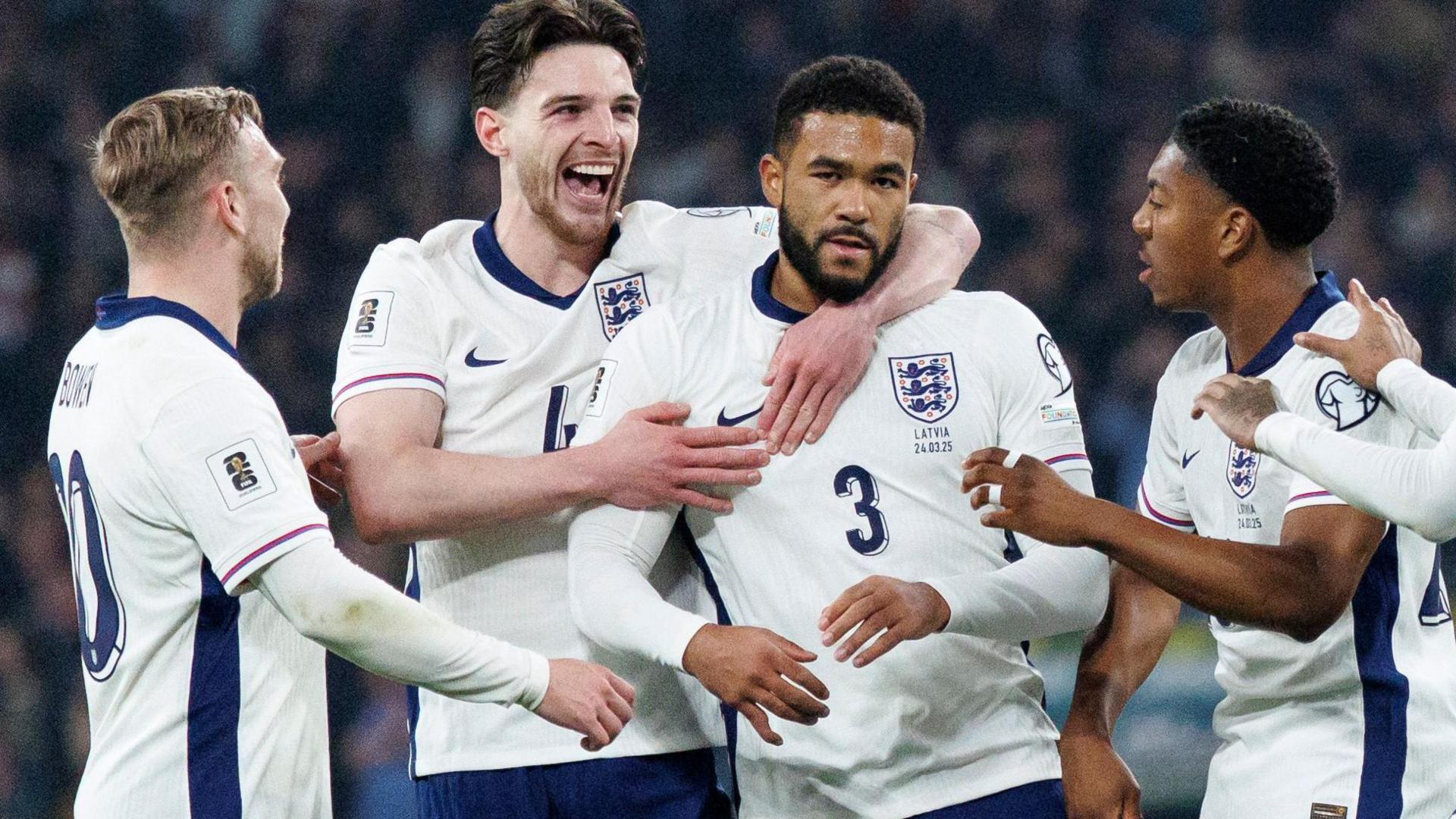 Reece James is mobbed by England team-mates after opening the scoring in the World Cup qualifier against Latvia at Wembley