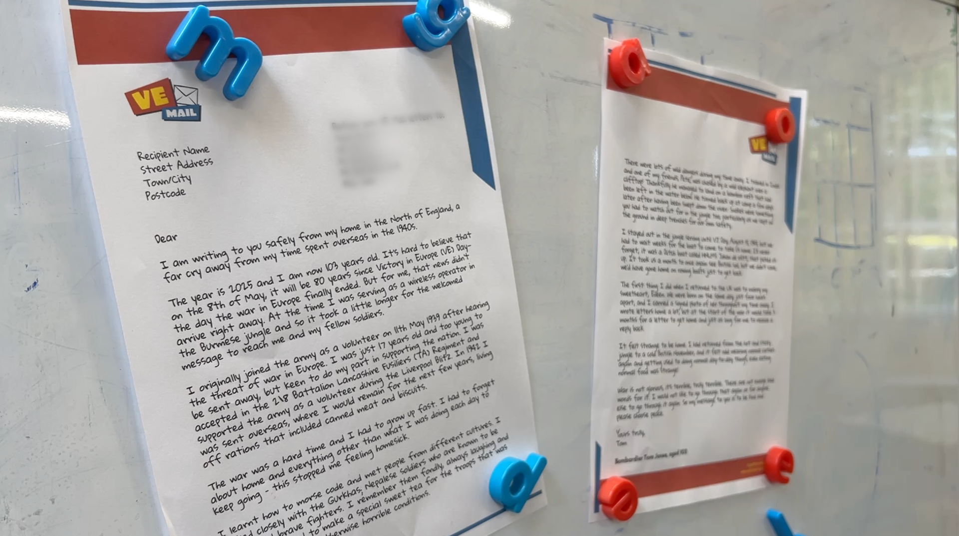 Tom Jones' letter on display at the school. It is stuck onto a whiteboard by several magnets.