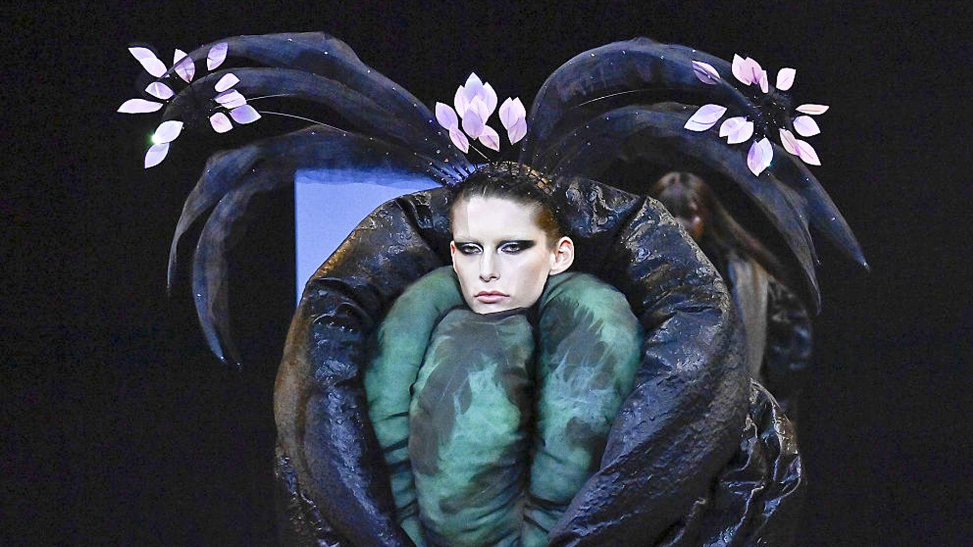 a model wearing a fun outfit with tussles on their head