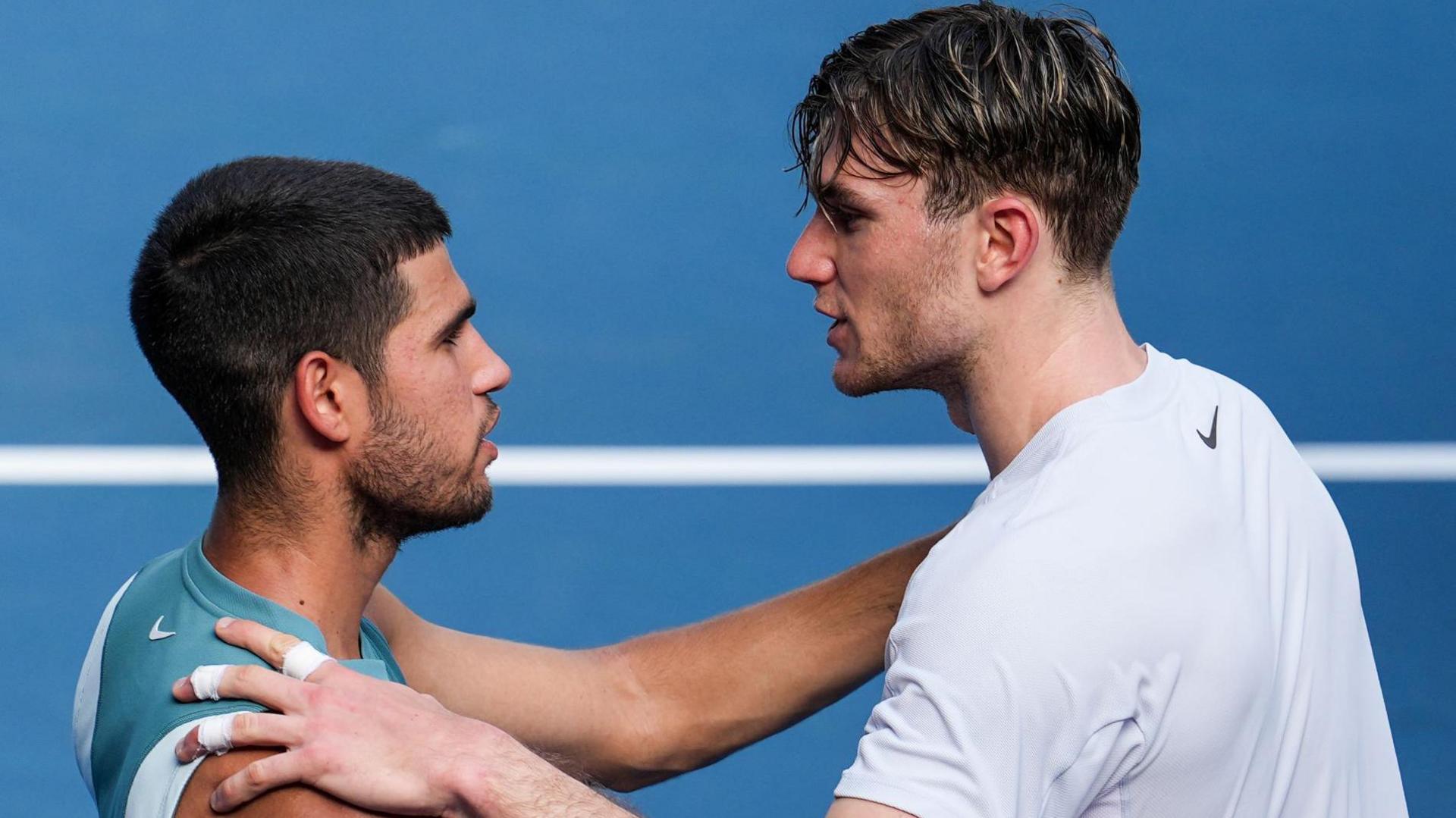 Jack Draper hugs Carlos Alcaraz aft  their 2025 Australian Open match