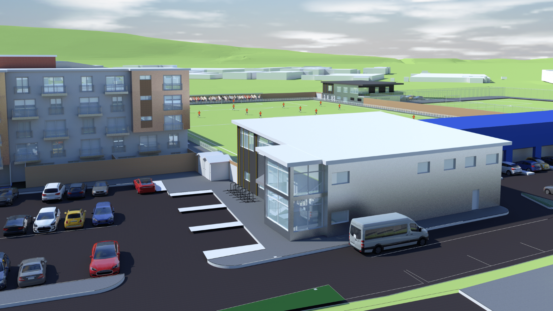 Artist's impression of the new football ground  with a computer generated car park, buildings and pitch.