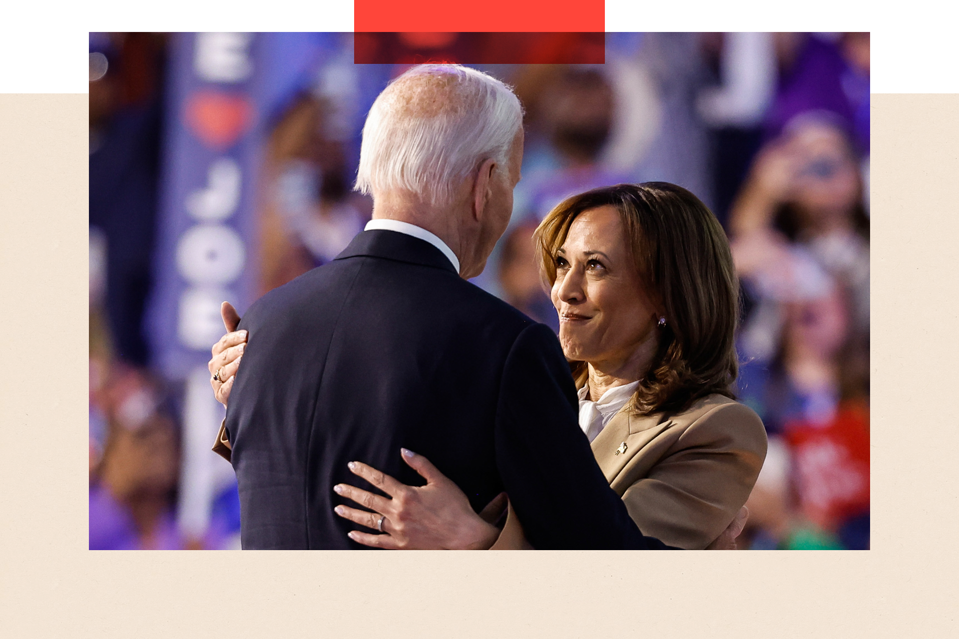 Kamala Harris and U.S. President Joe Biden greet each other in a hug