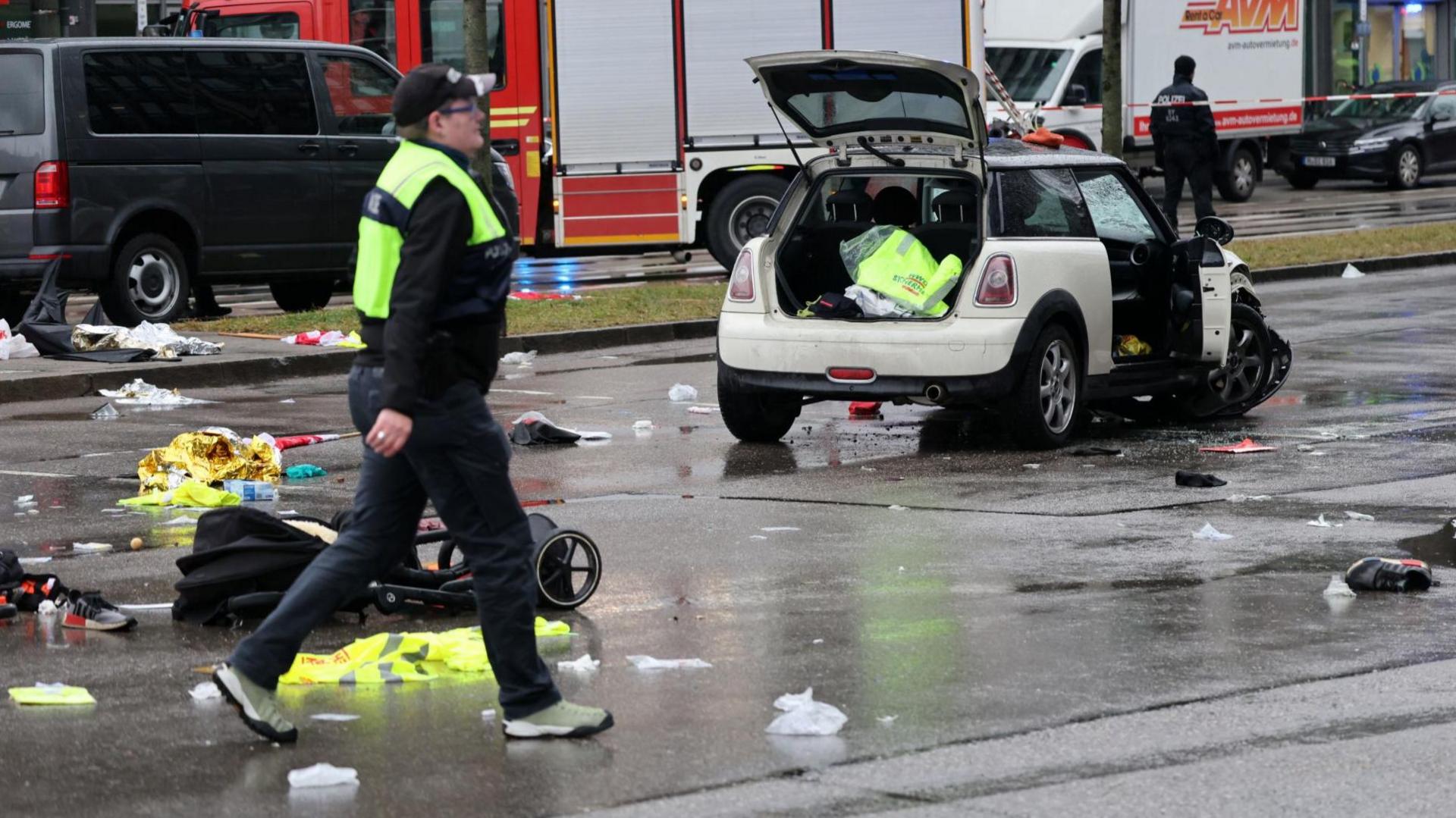 Aftermath of incident with damaged car