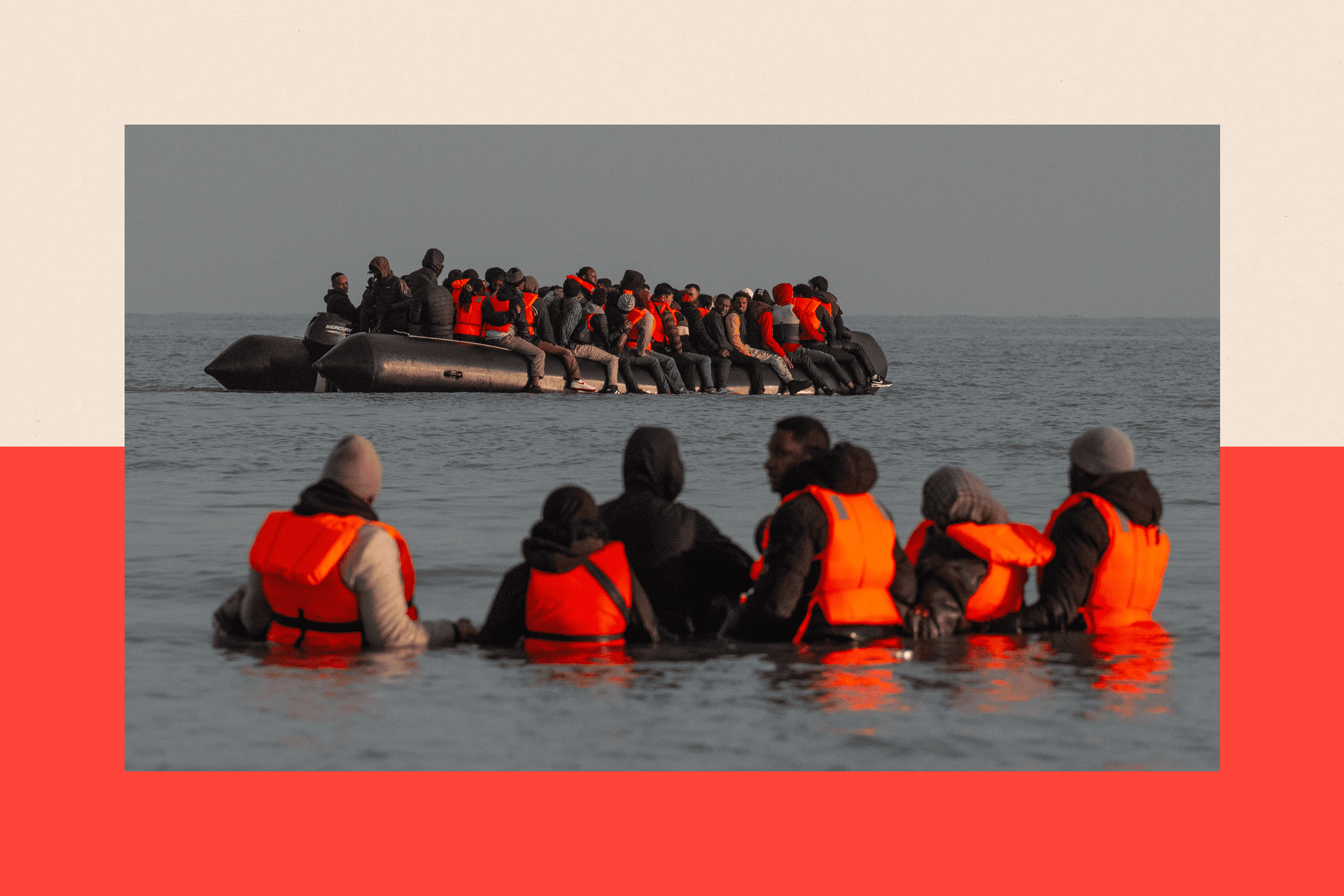 Migrants wait in the sea as a loaded dinghy sails away in Gravelines, France