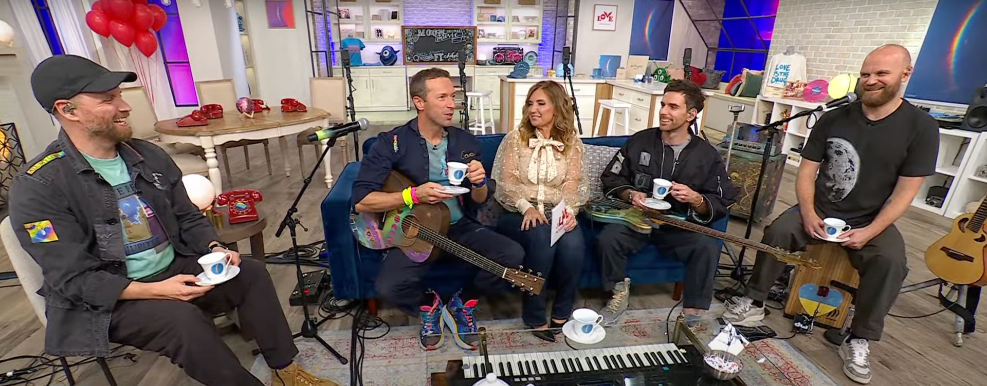 Coldplay appear on QVC with host Jennifer Coffey