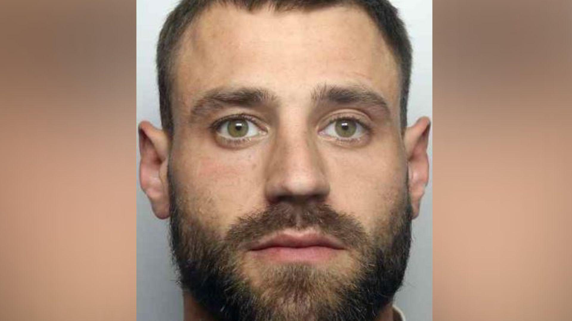 Police mugshot of a man
