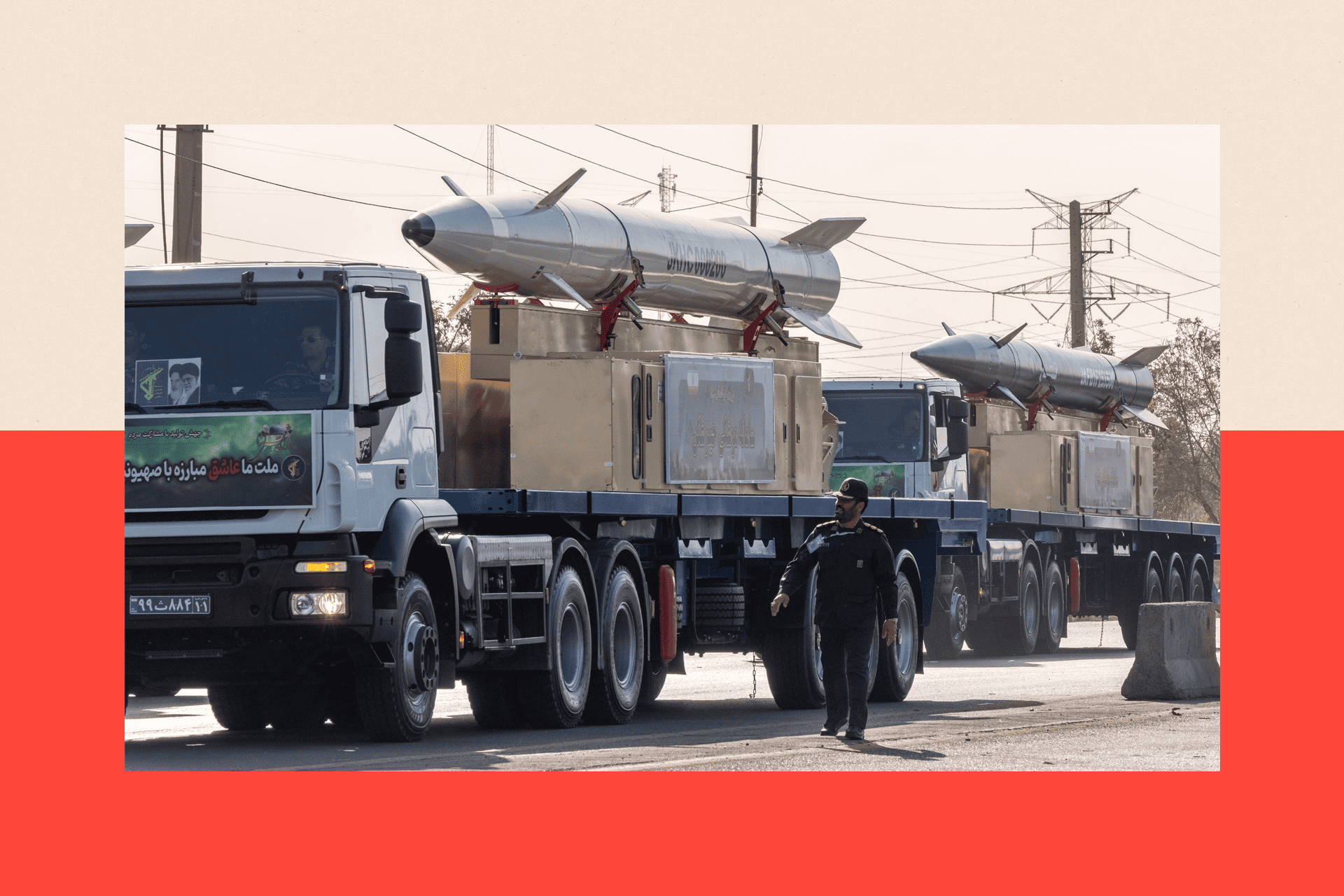 Iran's first-ever hypersonic missile, Fattah, and the Iranian Kheibar Shekan Ballistic missile, are carried by trucks during a military parade