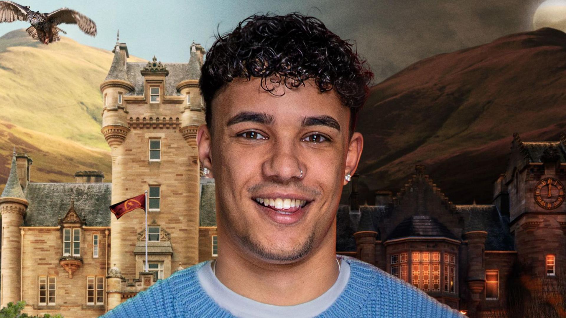 Publicity image of Freddie smiling against backdrop depicting the Highlands castle nestled in hills, with left half showing sunlight and the right half showing a moonlit night