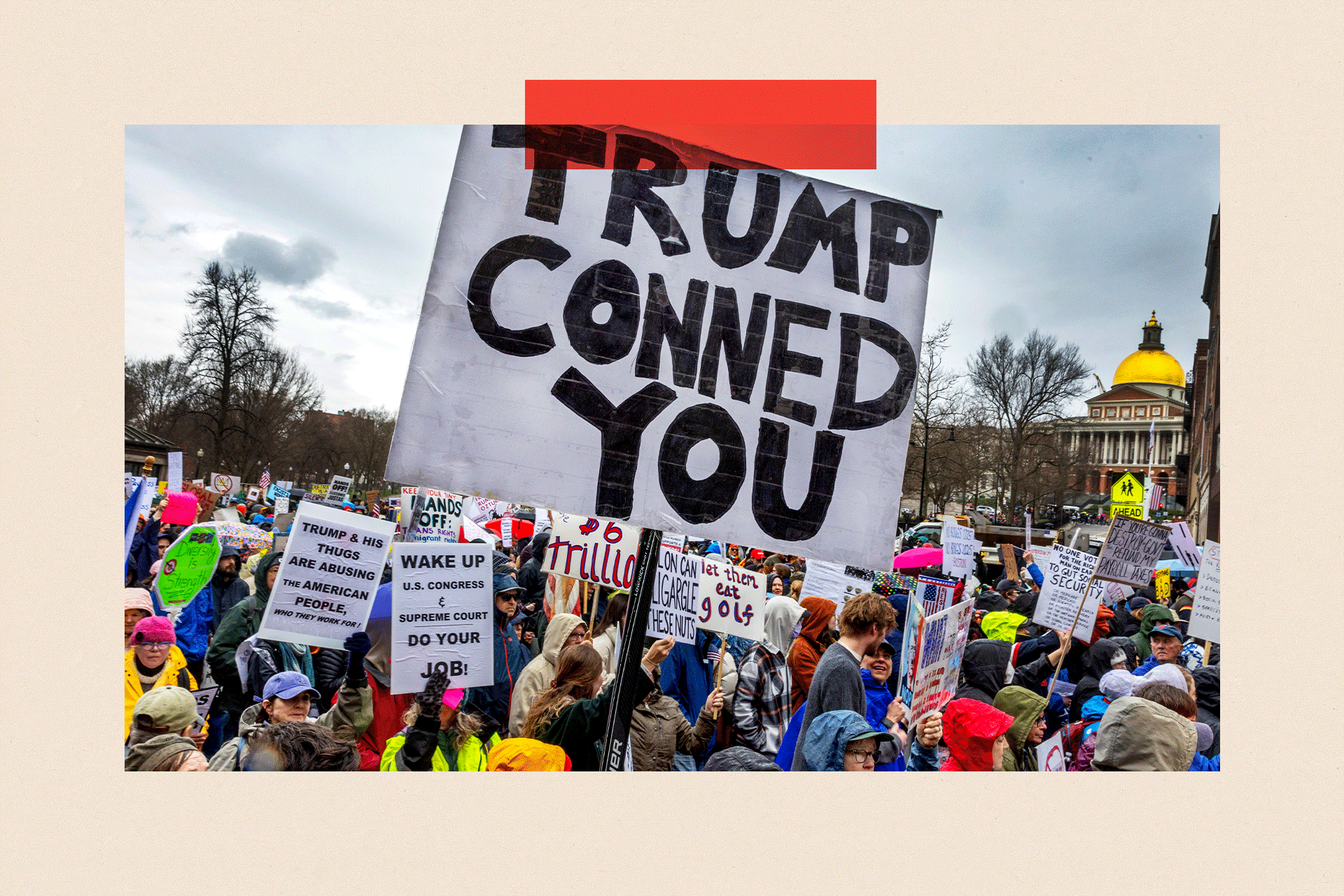 Demonstrators marching along Tremont St. from the Boston Common to City Hall in a "Hands Off" anti-Trump/Musk rally