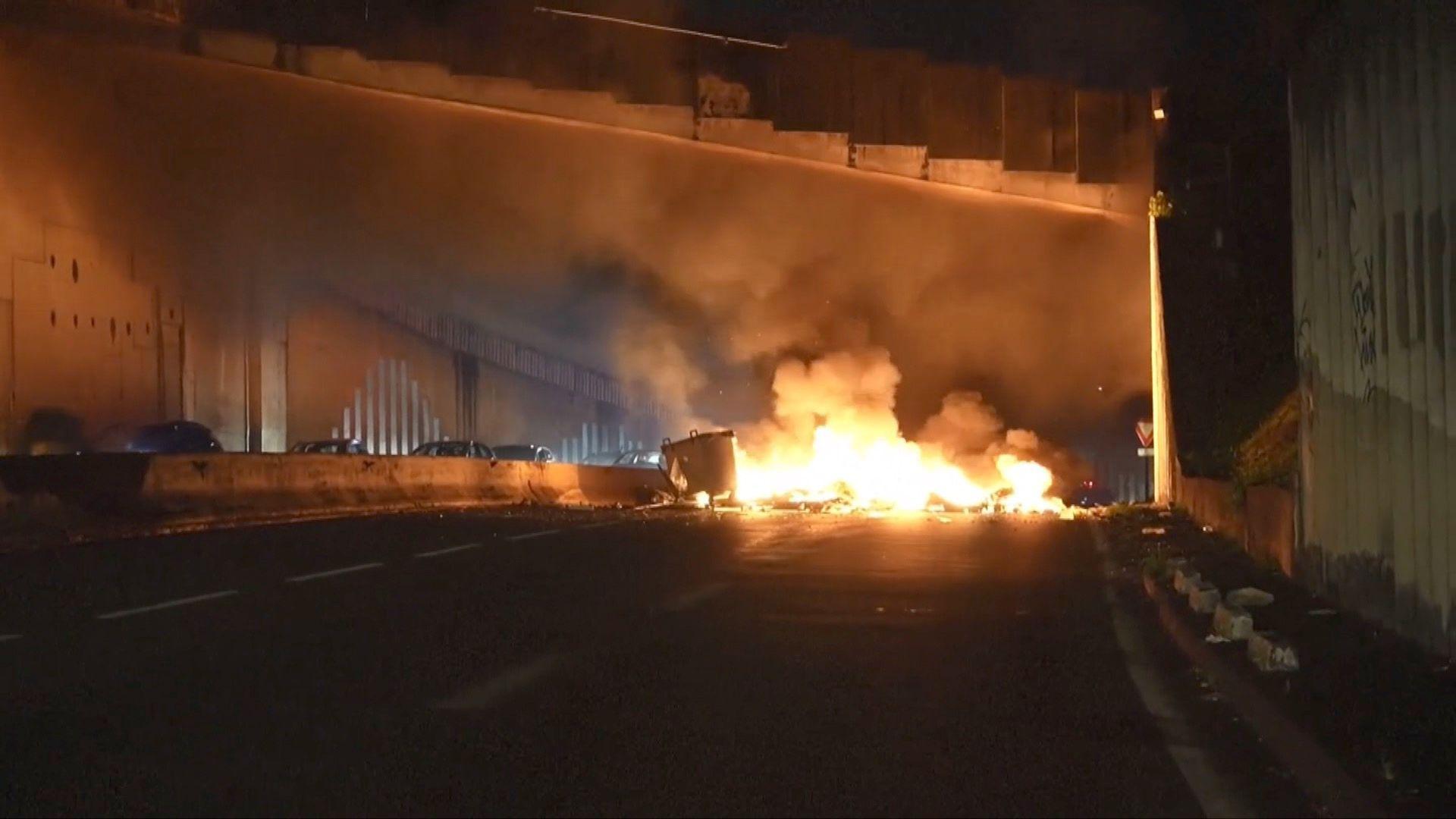 A fire blocks the road in Martinique