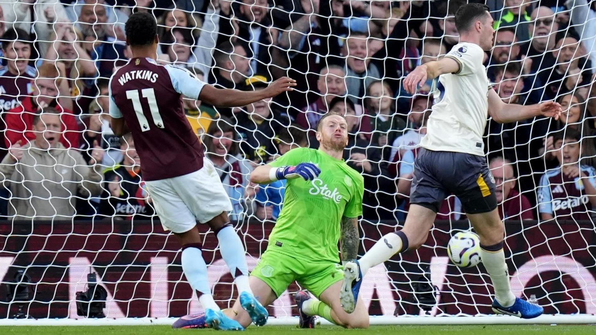 Aston Villa striker Ollie Watkins scores one of his two goals against Everton