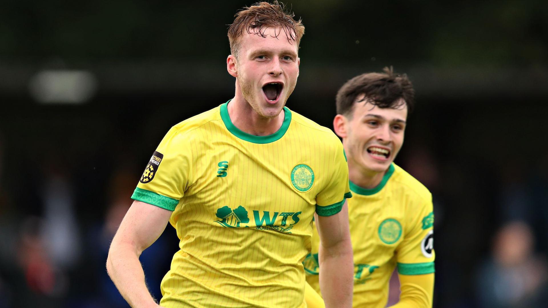 Zack Clarke celebrates after scoring Caernarfon's second against Crusaders