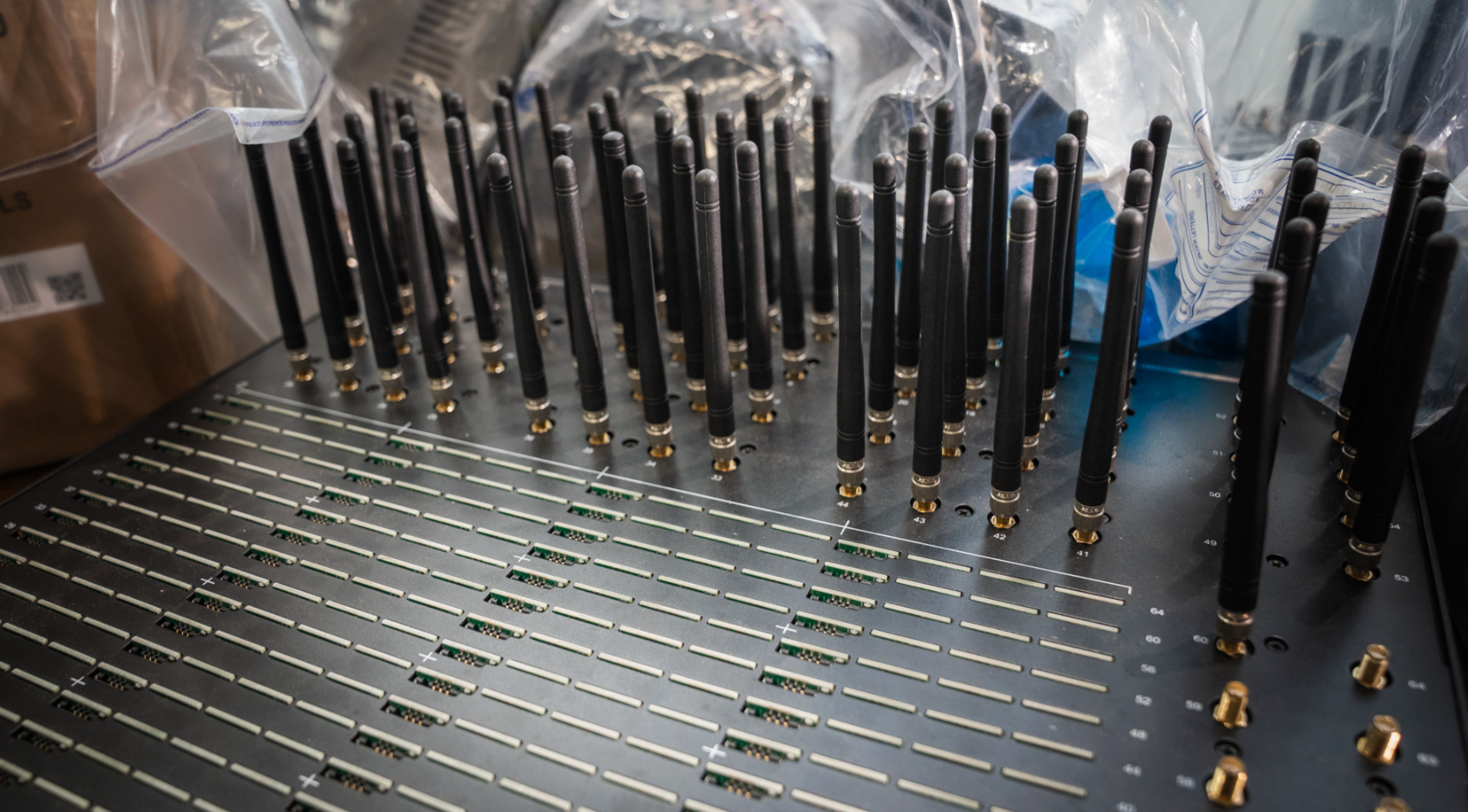 The Sim farm shown to our reporter includes lots of lines of slots for the cards themselves and then a variety of radio receivers sticking out at the top. There are as many as 64 slots for cards according to text on the device