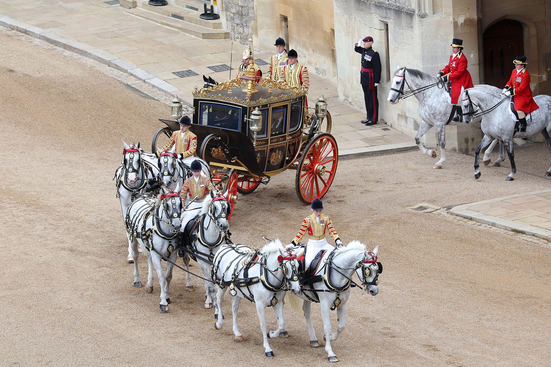 King Charles III and U.S. President Donald Trump in the Irish State Coach during the State visit by the President of the United States of America at Windsor Castle on September 17, 2025 in Windsor, England. 