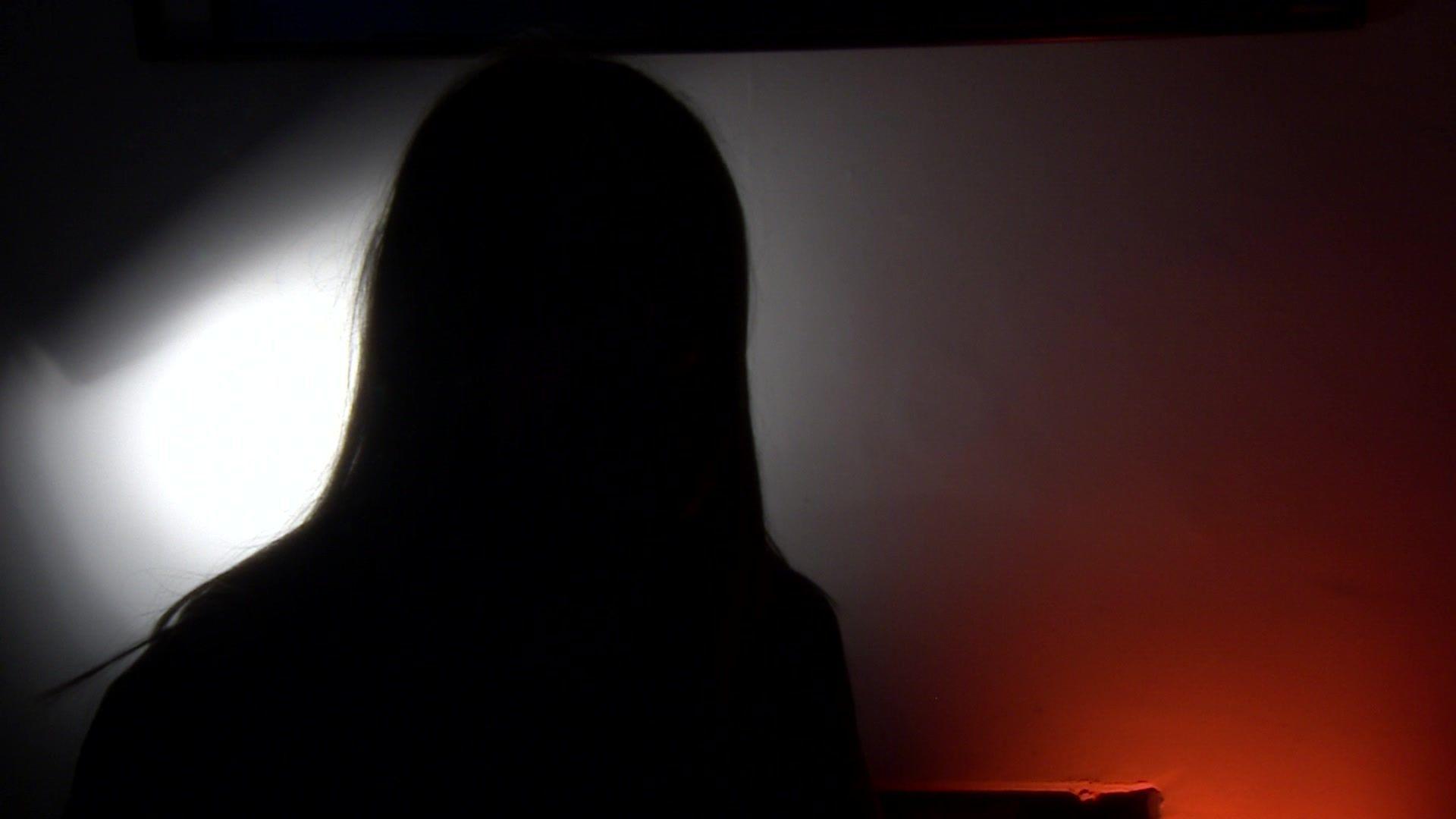 A woman in silhouette 