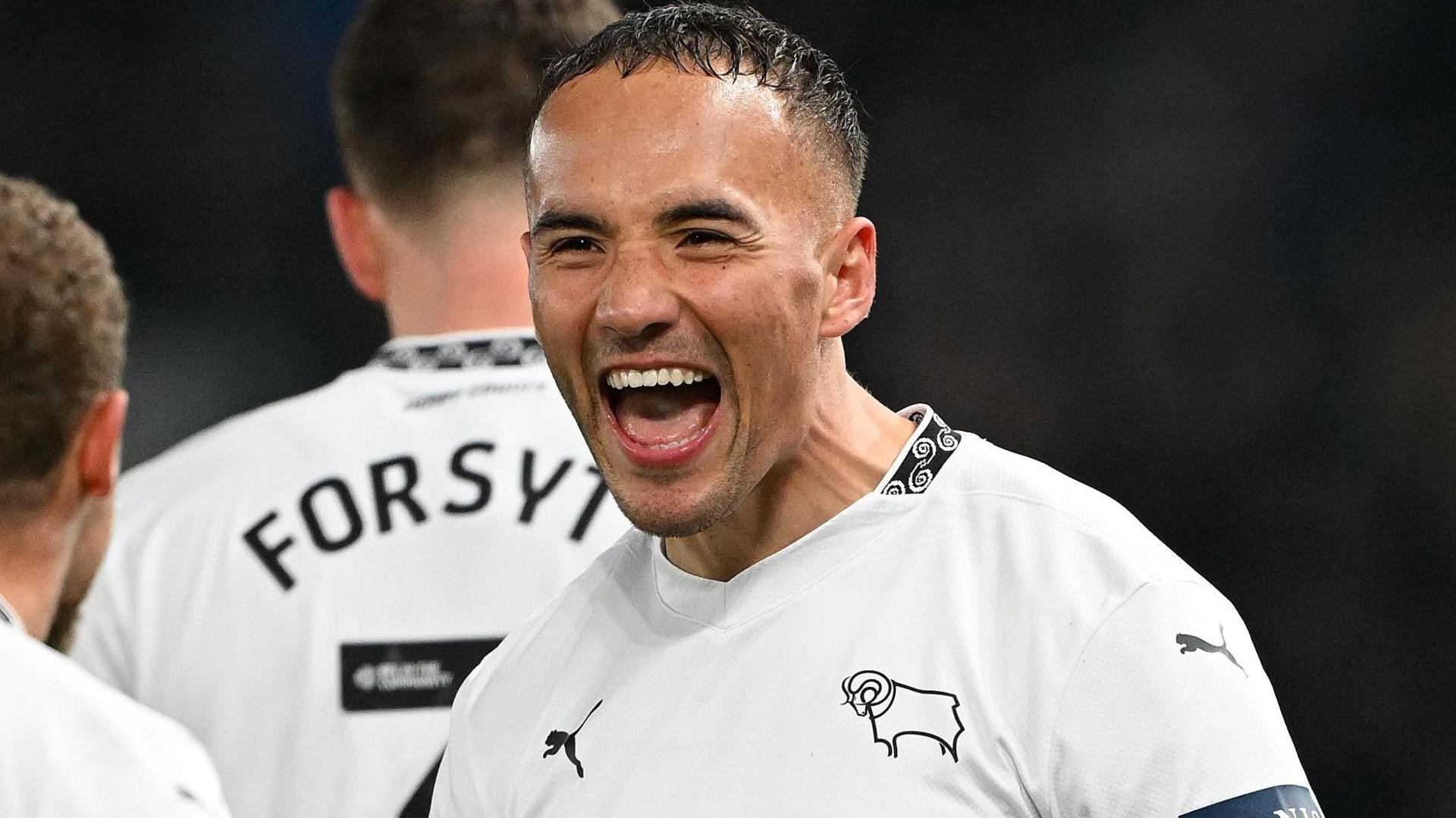 Derby County's Kane Wilson celebrating his goal in the 4-0 win against Portsmouth