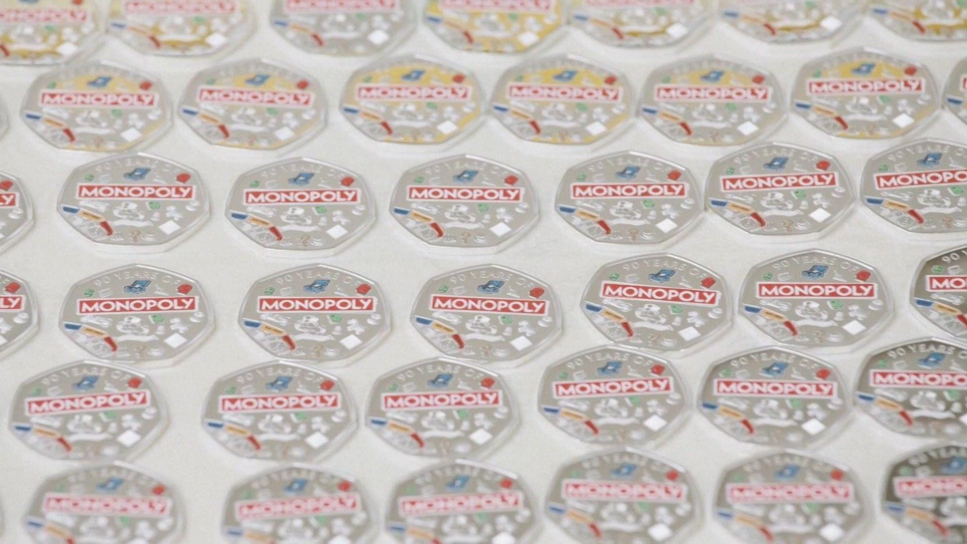 A tray of Monopoly coins