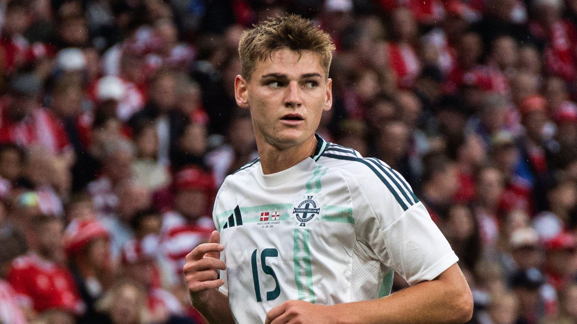 Justin Devenny in action for Northern Ireland