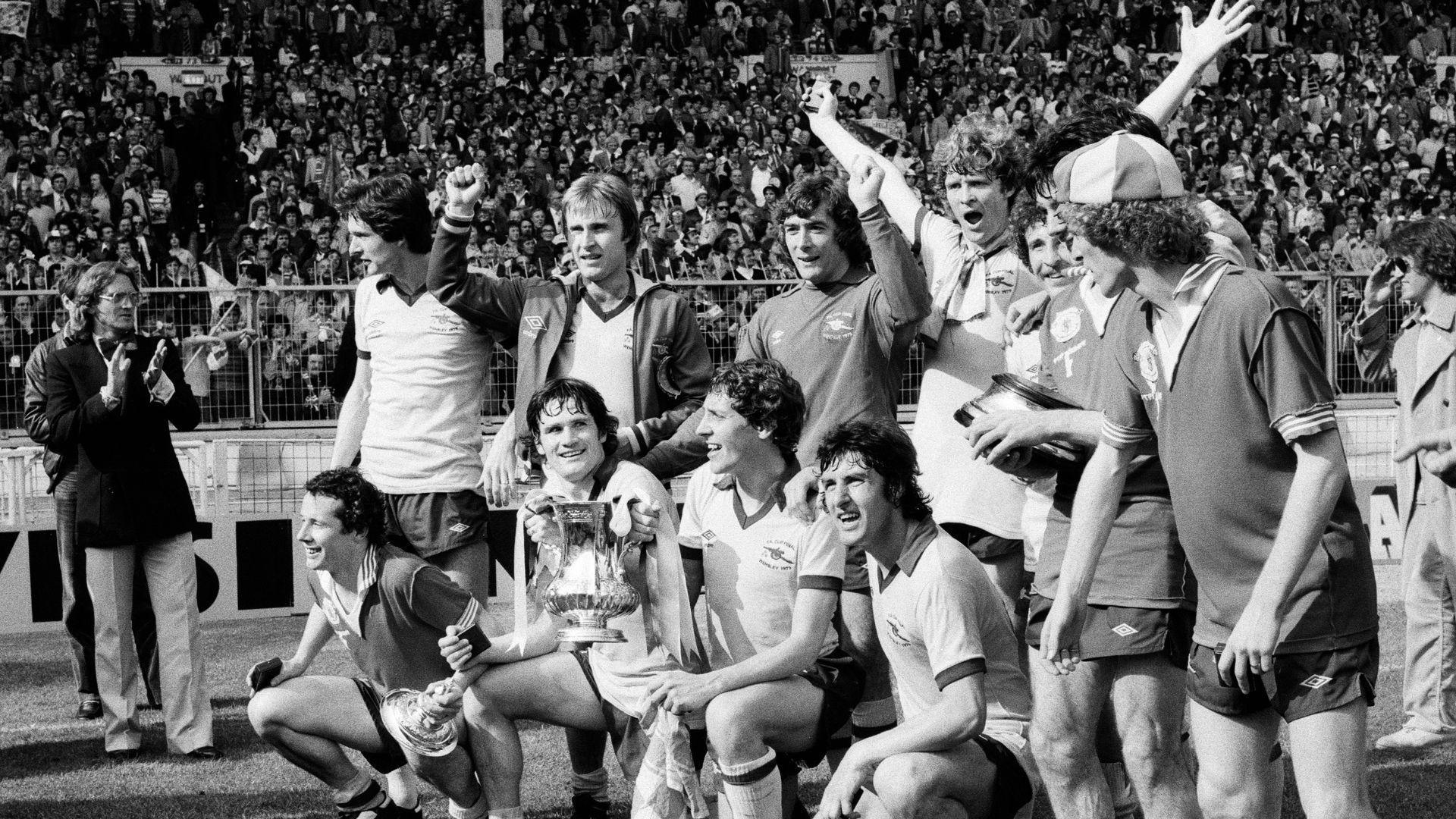 A black and white photo of Arsenal celebrating the FA Cup win in 1979.