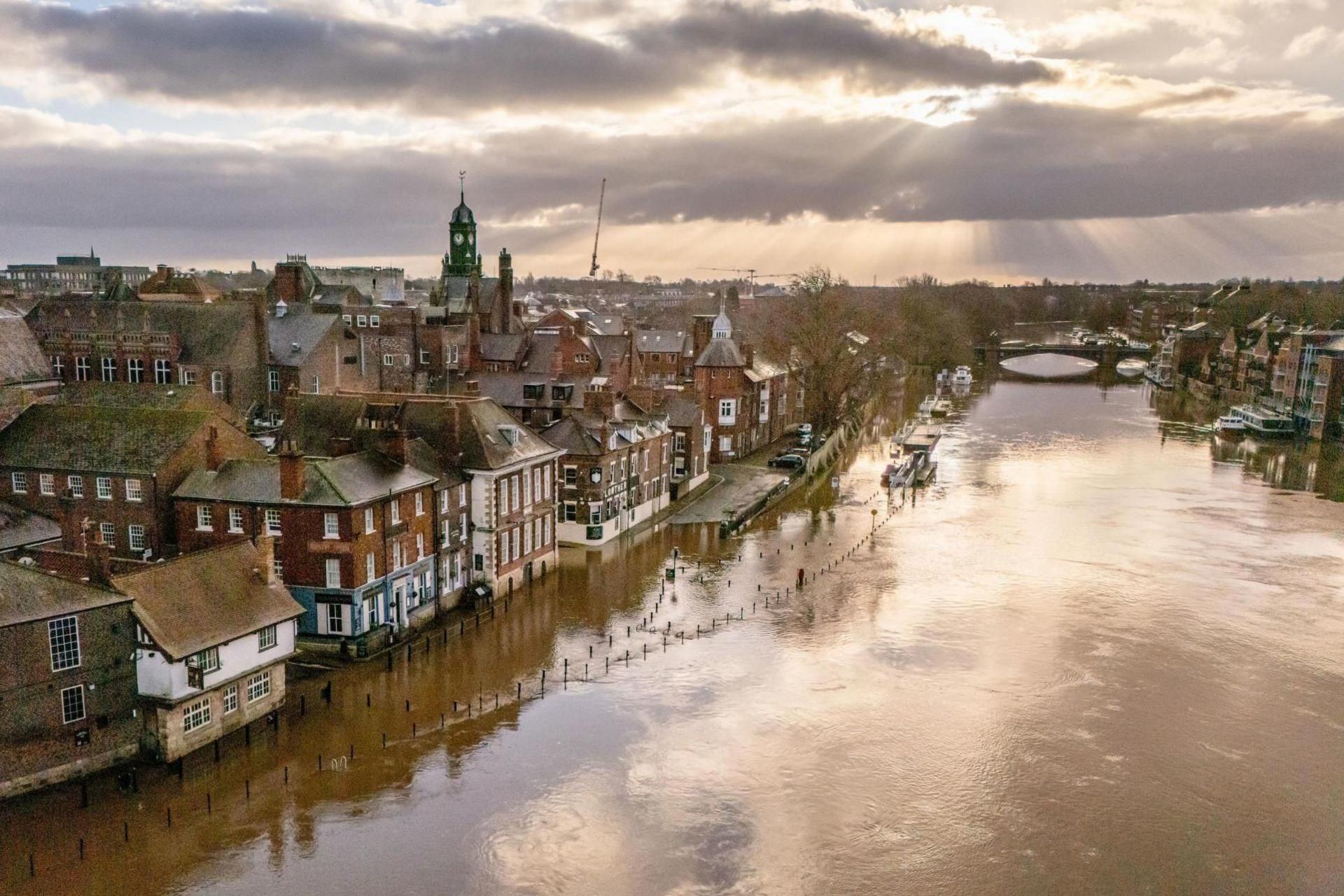 Flooded properties line the banks of the River Ouse, in York