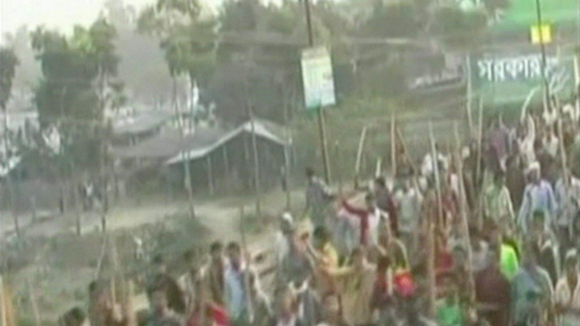 Pro-Sayeedi protesters in northern Bangladesh march with brooms