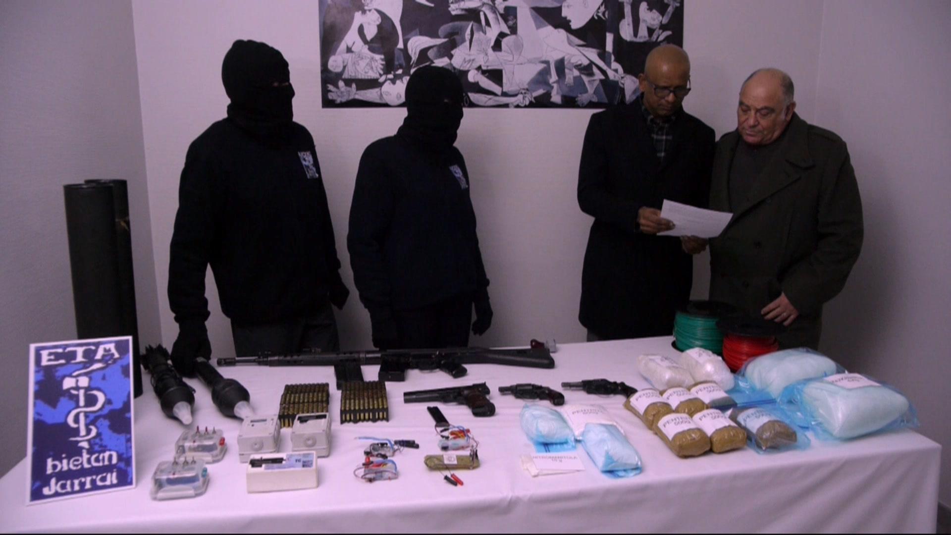 Eta arms handover, still from video, 21 Feb 14