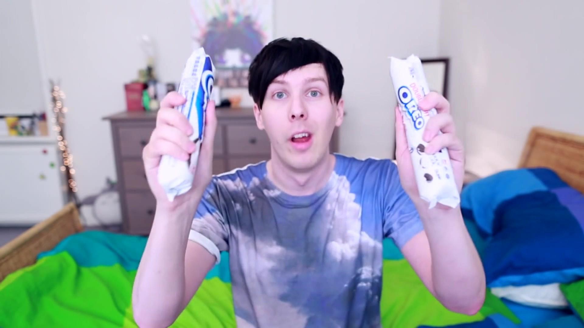 A vlogger holding Oreo biscuits