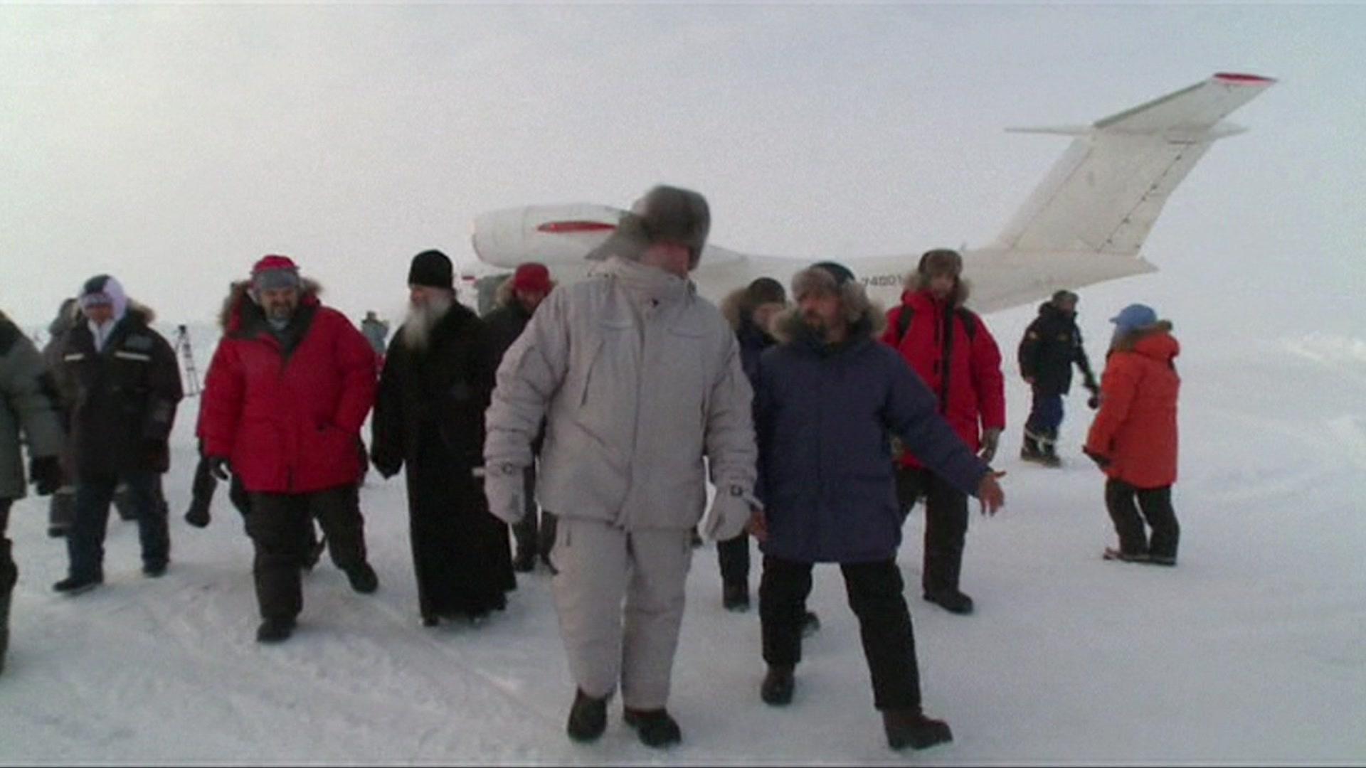 Mr Rogozin with group in Arctic (screengrab - APTN)