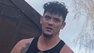 James Knight, a man with short and messy dark hair, is pictured outside wearing a black vest.