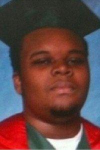 Michael Brown in a cap and gown