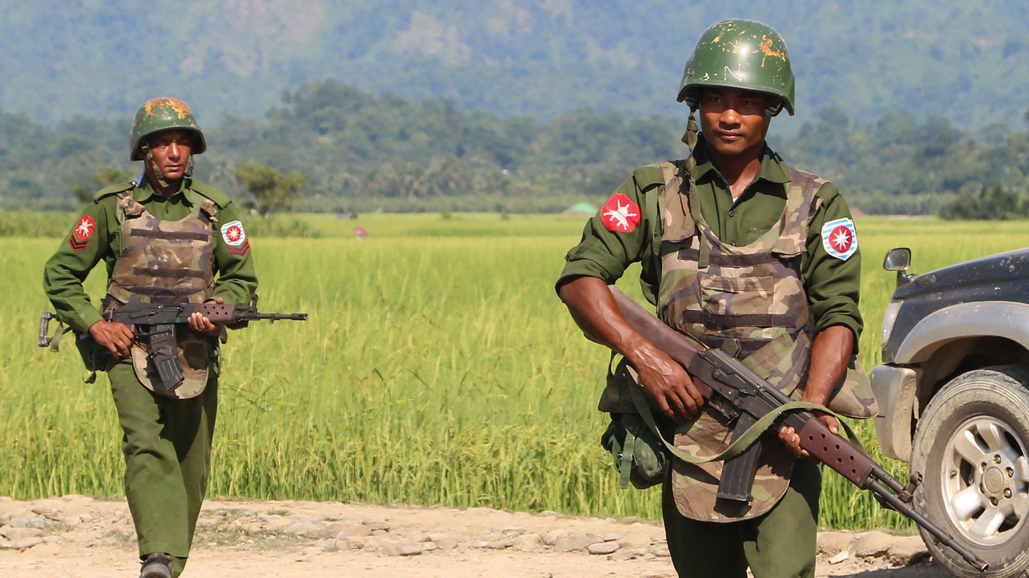 Myanmar army soldiers patrol a village in Maungdaw located in Rakhine State as security operation continue following the October 9, 2016 attacks by armed militant Muslim.