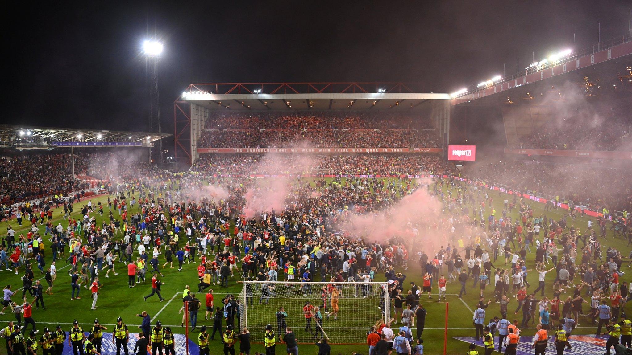 Fans came onto Nottingham Forest's pitch following their win against Sheffield United in the Championship play-offs in May 2022