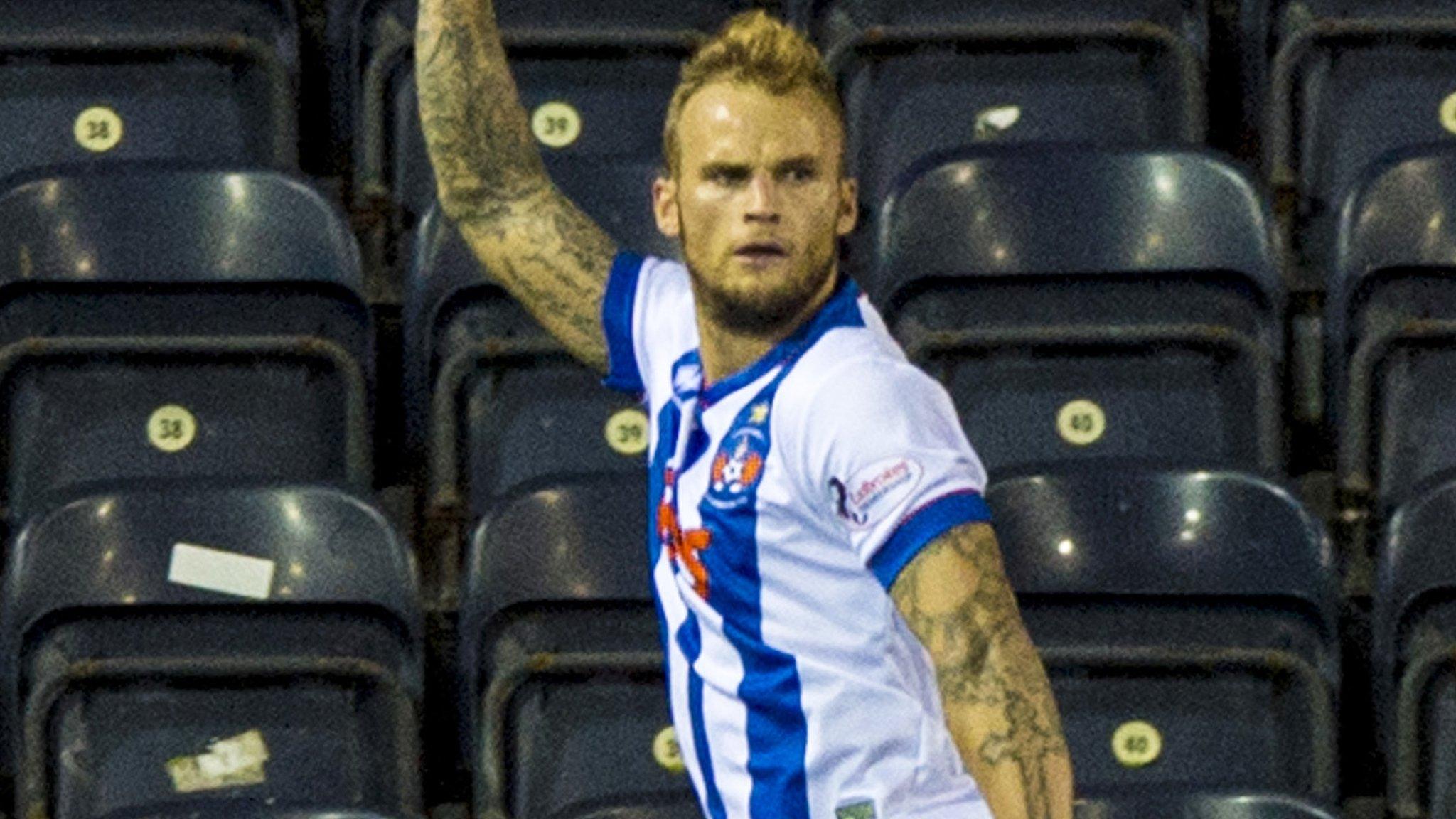 Kallum Higginbotham celebrates his late penalty equaliser