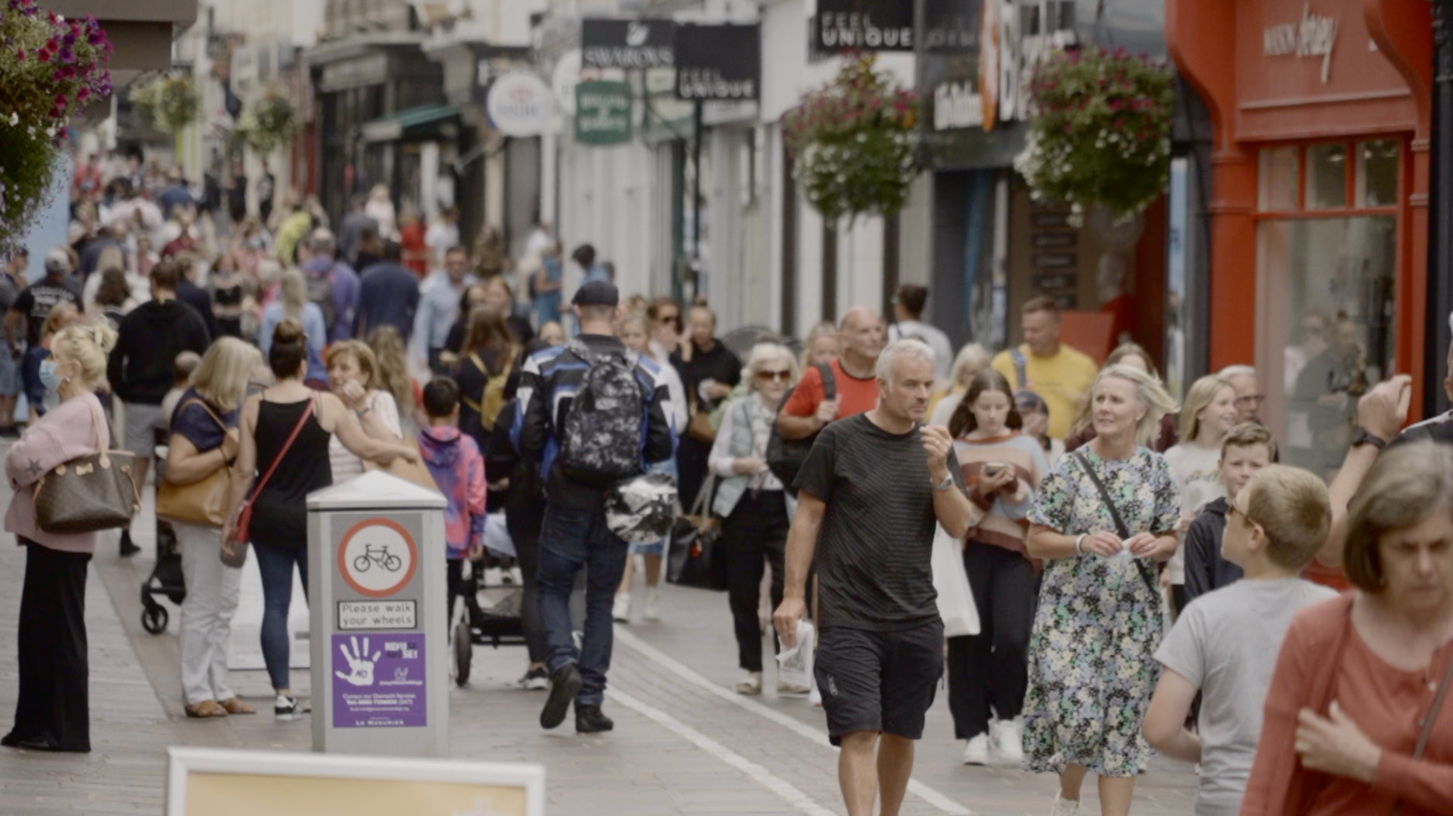 People walking through town in Jersey