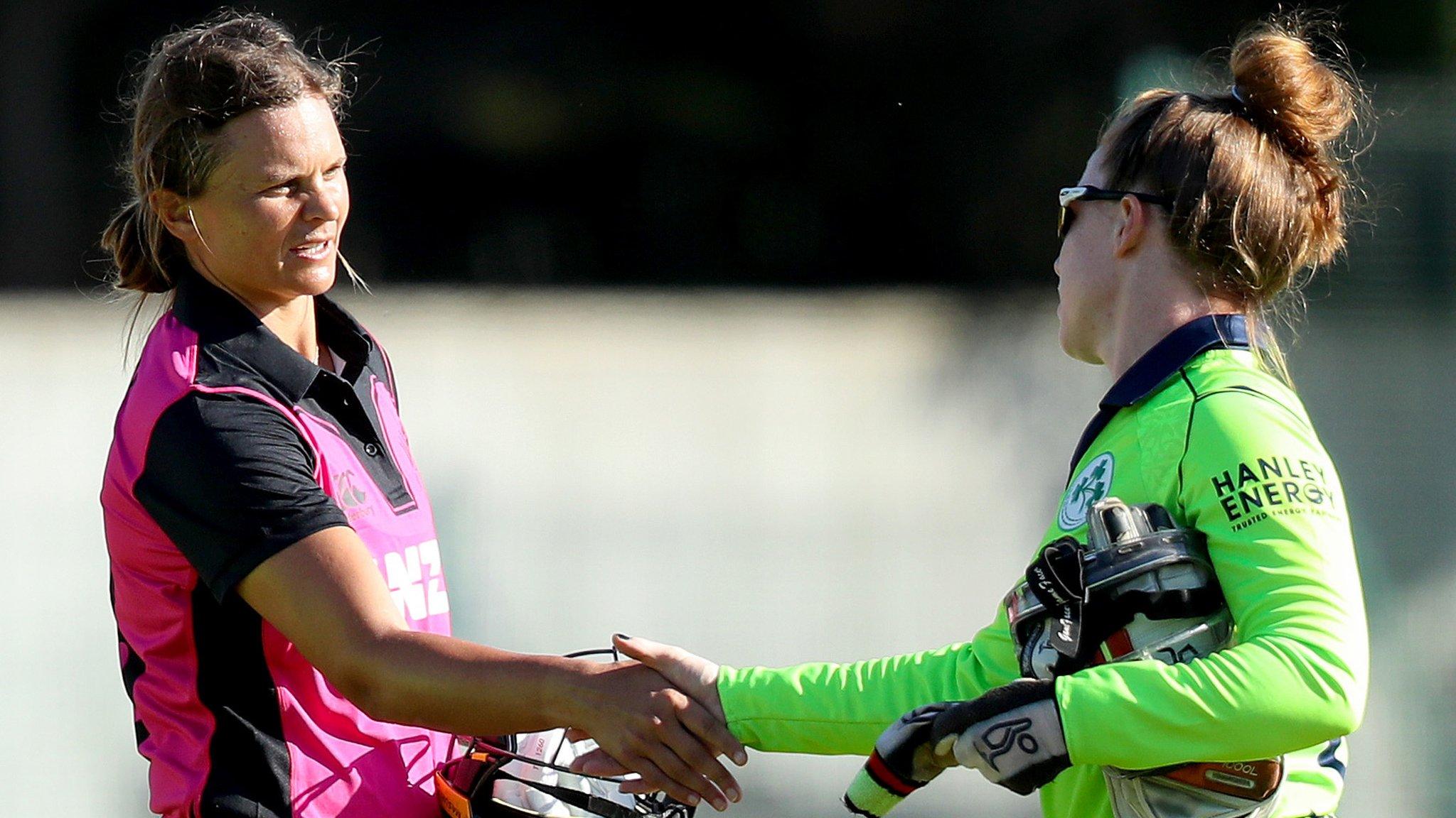 New Zealand opener Suzie Bates shakes hands with Mary Maldron after the hame